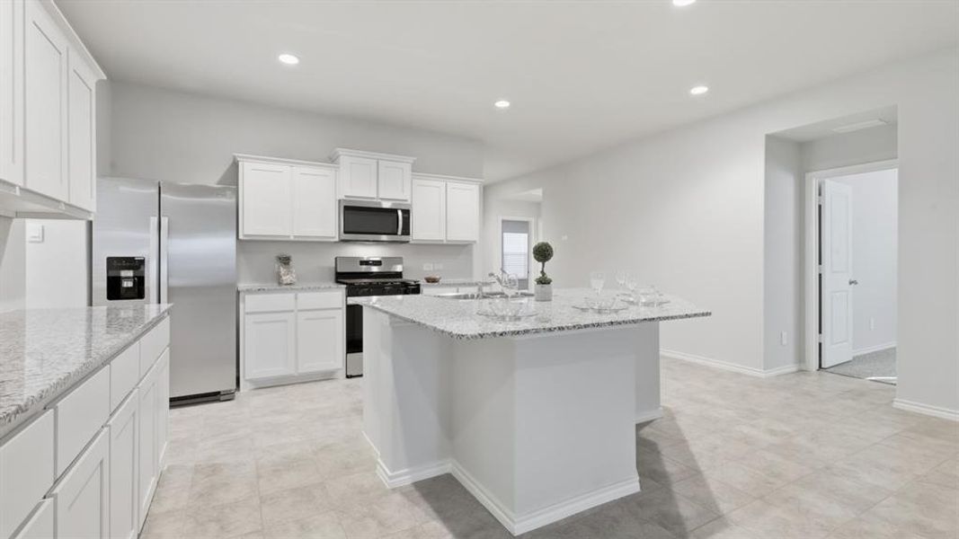 Kitchen-All Home and community information, including pricing, included features, terms, availability and amenities, are subject to change at any time without notice or obligation. All Drawings, pictures, photographs, video, square footages, floor plans, elevations, features, colors and sizes are approximate for illustration purposes only and will vary from the homes as built.