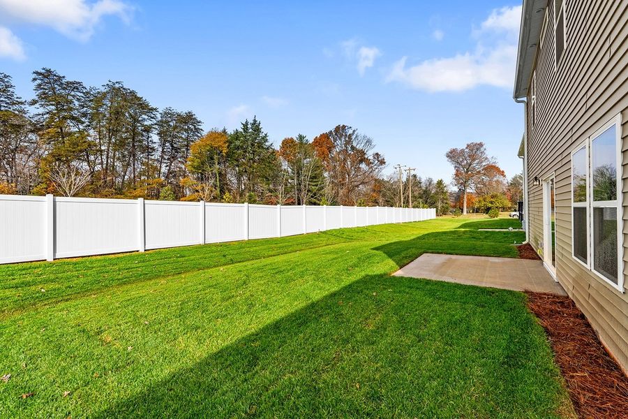 Exterior details and patio area of a home in Hanes Lake, Winston-Salem (Image 3).