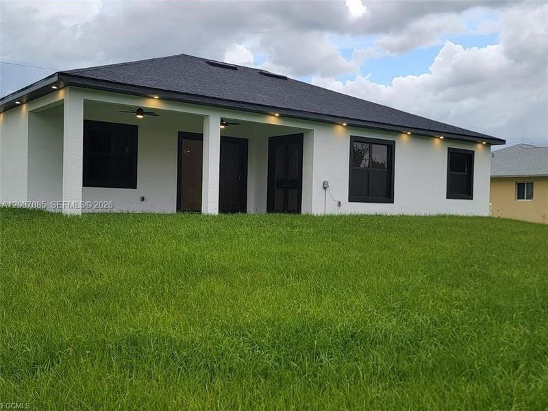 Exterior details and patio area of a home in , Lehigh Acres (Image 29). Exterior details and patio area of a home in , Lehigh Acres (Image 29).
