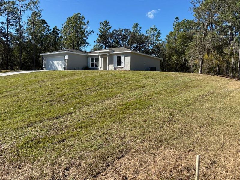 Exterior details and patio area of a home in , Citrus Springs (Image 21).