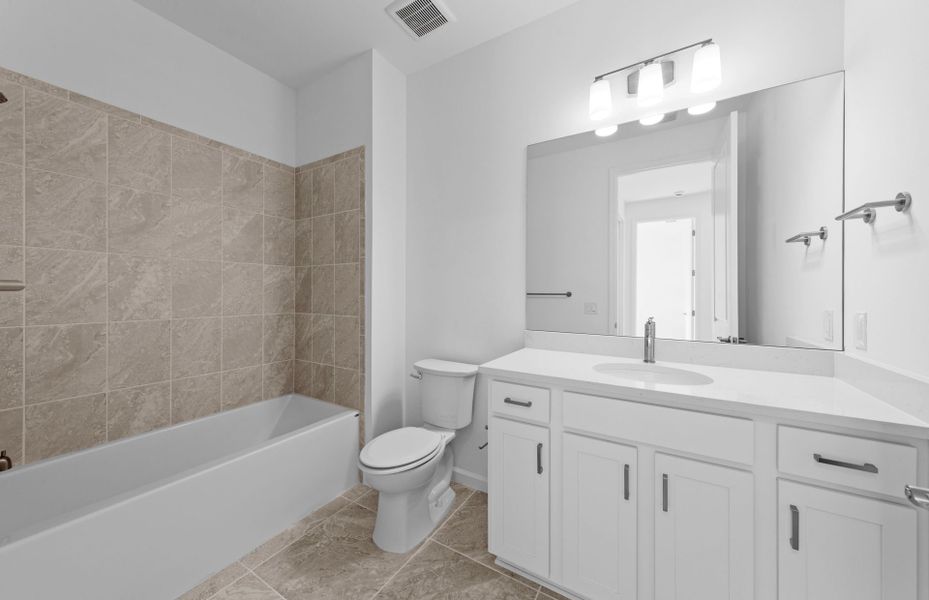 Furnished interior view inside a new home in Del Webb Naples, Ave Maria (Image 10).