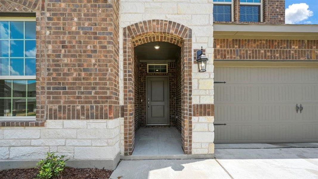 Exterior details and patio area of a home in Silverado, Aubrey (Image 1). Exterior details and patio area of a home in Silverado, Aubrey (Image 1).