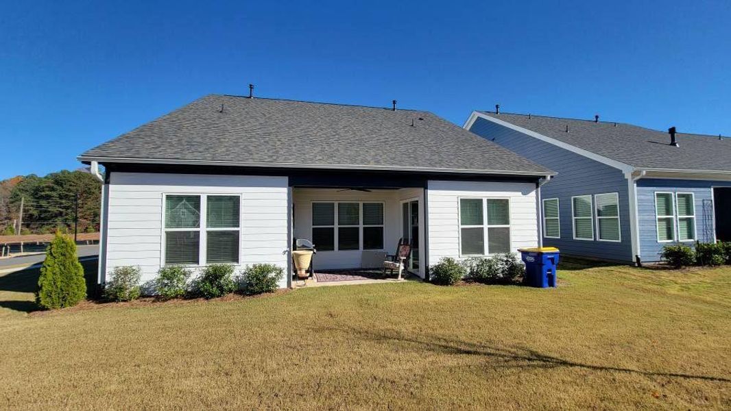 Exterior details and patio area of a home in The Reserve at Bells Ferry, Kennesaw (Image 30).