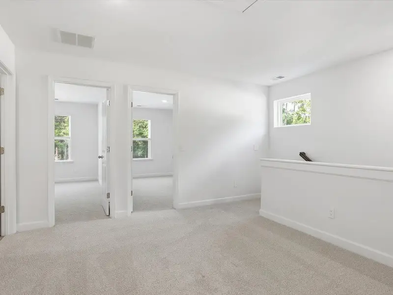 Spacious, unfurnished interior of a new home in Courts at Brook Run, Moncks Corner (Image 10).