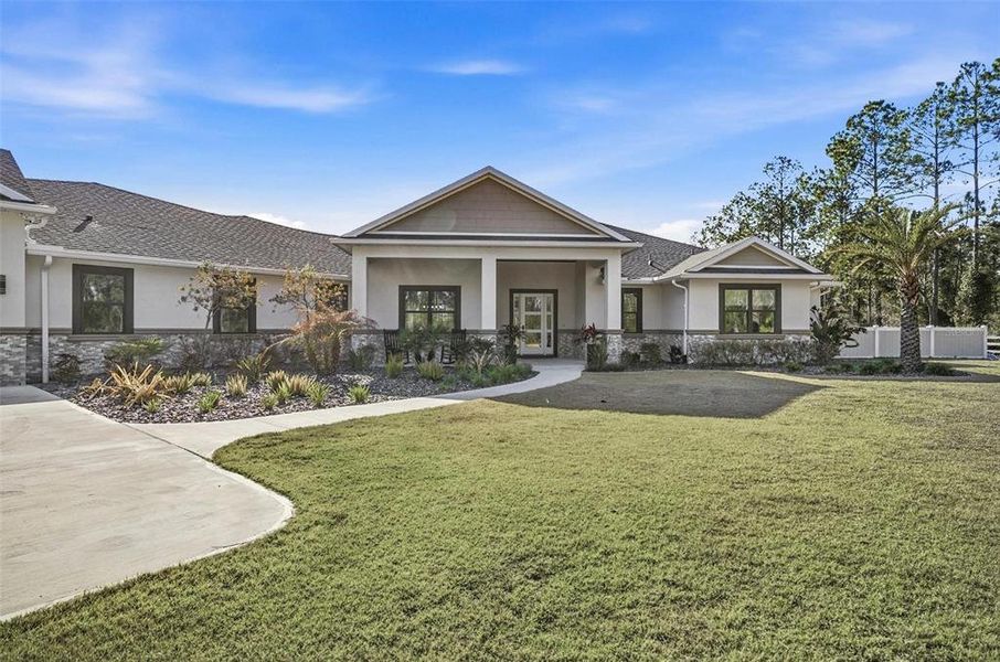 Front exterior of a new home in , Palm Coast, FL, highlighting curb appeal (Image 25).