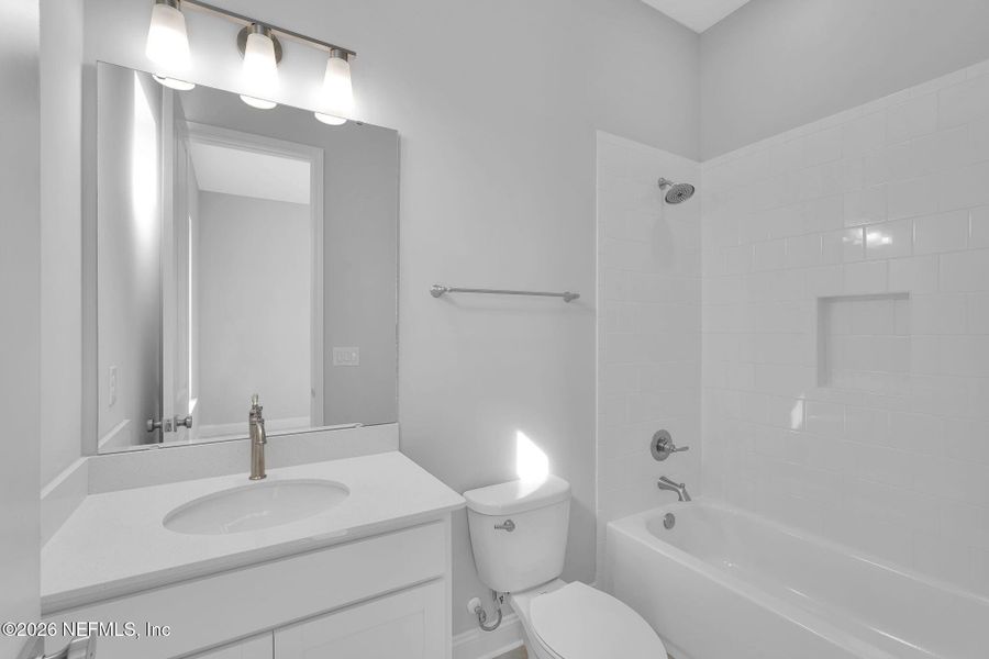 Furnished interior view inside a new home in Amelia National Country Club, Fernandina Beach (Image 12).