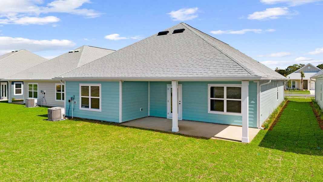 Exterior details and patio area of a home in Caballeros Estates At Hombre, Panama City Beach (Image 4).