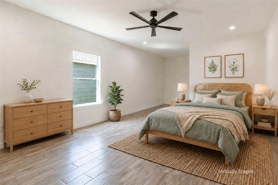 The primary suite has space for a full furniture setup and a dresser without squeezing the walkways. The primary suite has space for a full furniture setup and a dresser without squeezing the walkways.