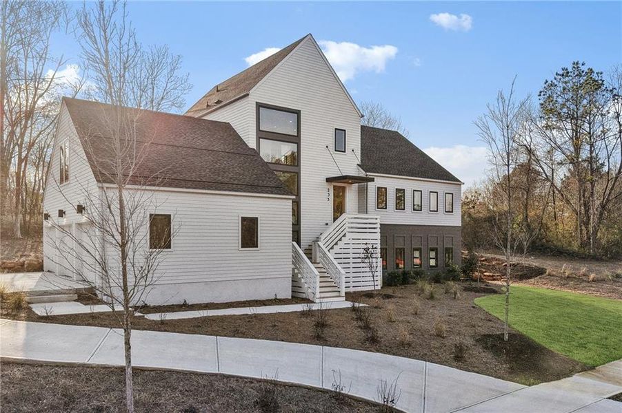 Front exterior of a new home in , Roswell, GA, highlighting curb appeal (Image 32).