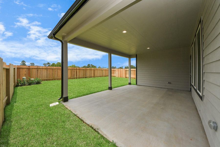 Come and see this spacious backyard with its beautiful covered patio. There is plenty of room for the kids to play and adults to relax. Perfect for your outdoor living space, patio furniture, bbq pit, and so much more. The possibilities are endless! Sample photo of completed home with similar floor plan. Actual colors and selections may vary. Come and see this spacious backyard with its beautiful covered patio. There is plenty of room for the kids to play and adults to relax. Perfect for your outdoor living space, patio furniture, bbq pit, and so much more. The possibilities are endless! Sample photo of completed home with similar floor plan. Actual colors and selections may vary.
