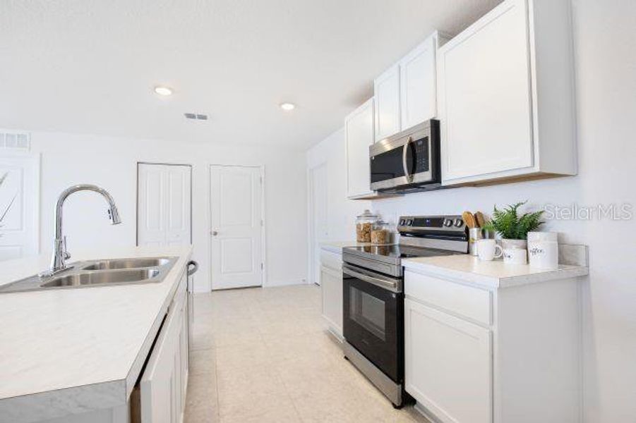 Furnished interior view inside a new home in Royal Highlands, Weeki Wachee (Image 10).