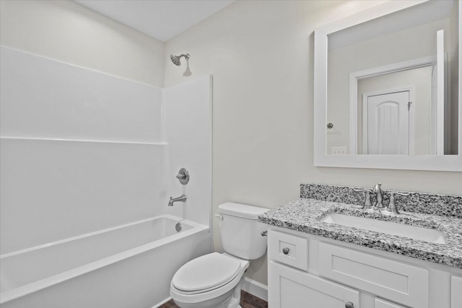 Representative furnished interior of a home built from the Morgan by Enchanted Homes in Lonesome Dove, San Antonio (Image 13).