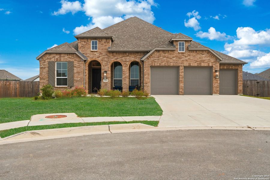 Front exterior of a new home in , Bulverde, TX, highlighting curb appeal (Image 1). Front exterior of a new home in , Bulverde, TX, highlighting curb appeal (Image 1).