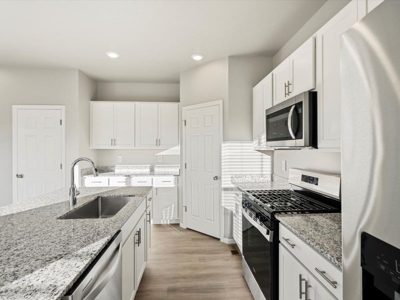 Furnished interior view inside a new home in Lorson Ranch : The Springs Collection, Colorado Springs (Image 3).