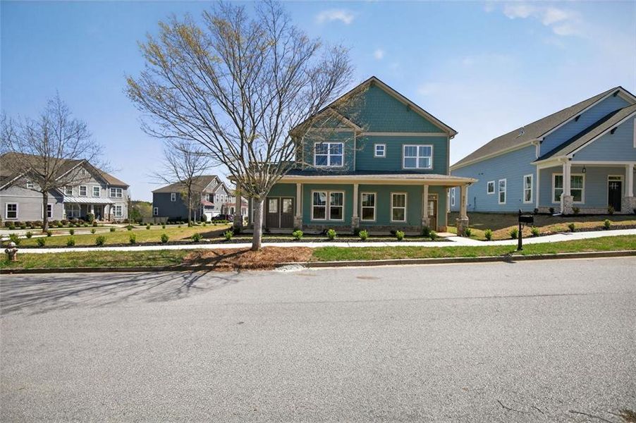Front exterior of a new home in , Douglasville, GA, highlighting curb appeal (Image 20). Front exterior of a new home in , Douglasville, GA, highlighting curb appeal (Image 20).