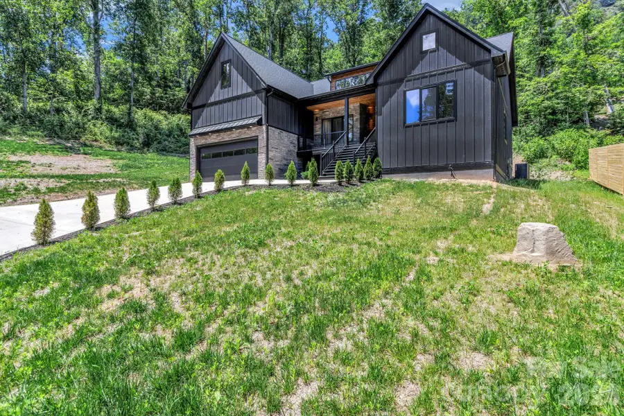 Front exterior of a new home in , Fairview, NC, highlighting curb appeal (Image 25).