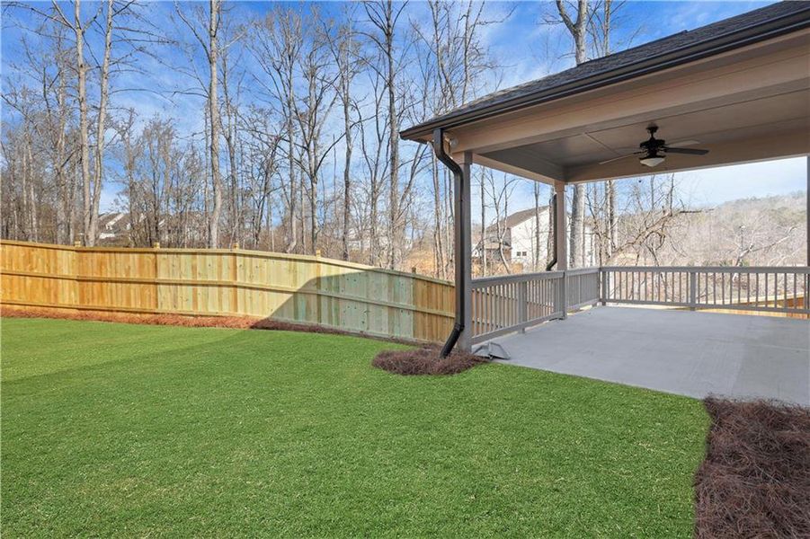 Exterior details and patio area of a home in Marble Tree, Ball Ground (Image 3).