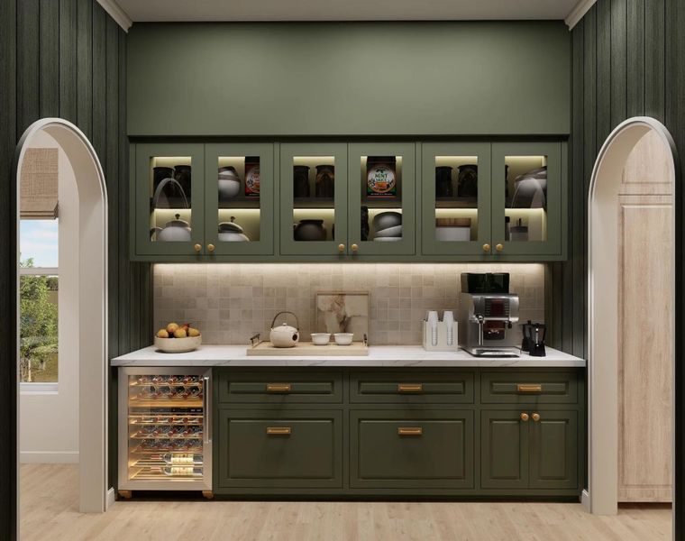 Butler’s pantry with built-in beverage station and additional storage. Butler’s pantry with built-in beverage station and additional storage.