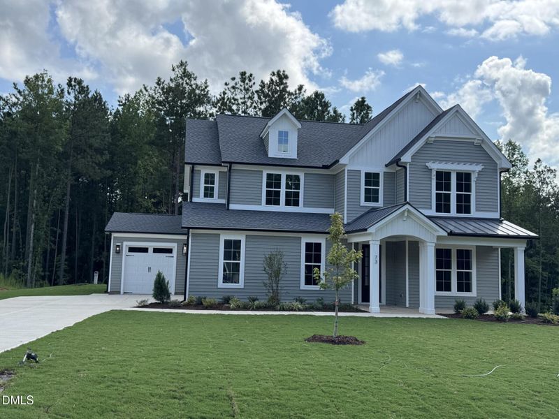 Front exterior of a new home in Baylee Ridge, Selma, NC, highlighting curb appeal (Image 1). Front exterior of a new home in Baylee Ridge, Selma, NC, highlighting curb appeal (Image 1).