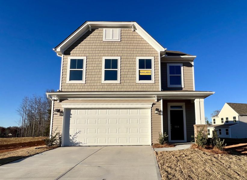 Front exterior of a new home in Bellevue, Greenville, SC, highlighting curb appeal (Image 1). Front exterior of a new home in Bellevue, Greenville, SC, highlighting curb appeal (Image 1).