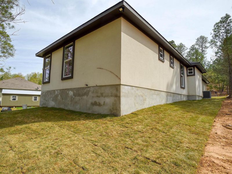 Exterior details and patio area of a home in , Bastrop (Image 3).