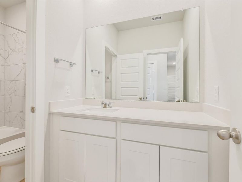 Furnished interior view inside a new home in Spring Branch Crossing, Conroe (Image 27).