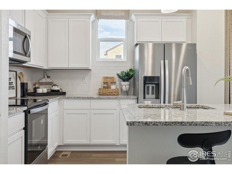 Furnished interior view inside a new home in Settlers Crossing, Commerce City (Image 21).