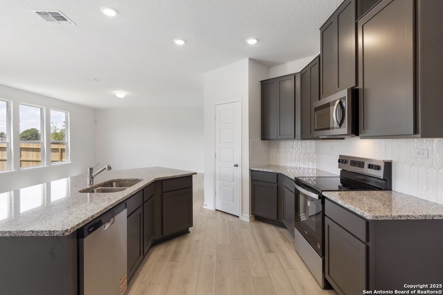 Furnished interior view inside a new home in Woodside Farms, Seguin (Image 8). Furnished interior view inside a new home in Woodside Farms, Seguin (Image 8).