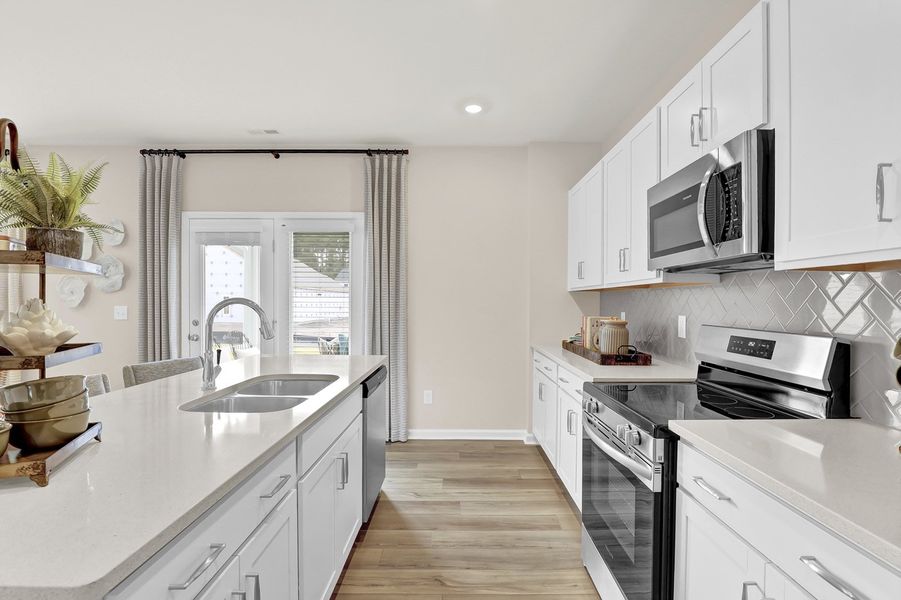 Representative furnished interior of a home built from the Turner - Genesis Value Collection by Mungo Homes in Stapleton, Clemmons (Image 3).