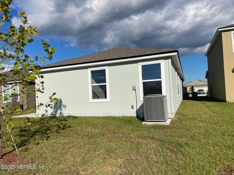 Exterior details and patio area of a home in The Arbors, Jacksonville (Image 3).