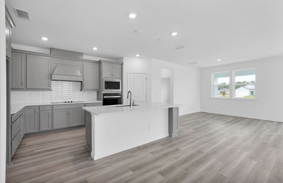 Furnished interior view inside a new home in Hyland Trail, Green Cove Springs (Image 3).