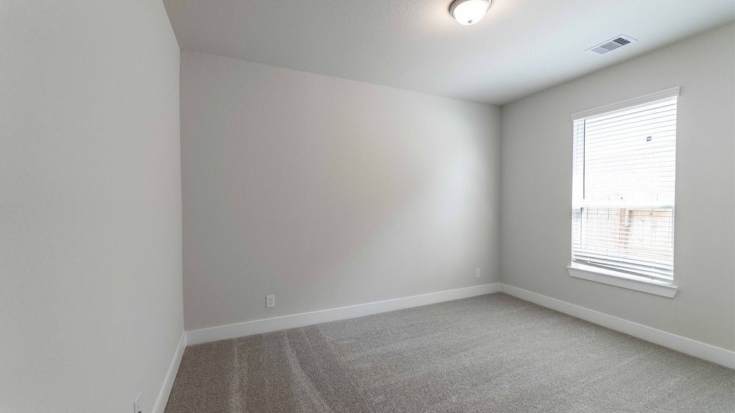 Spacious, unfurnished interior of a new home in Sunterra, Katy (Image 23).