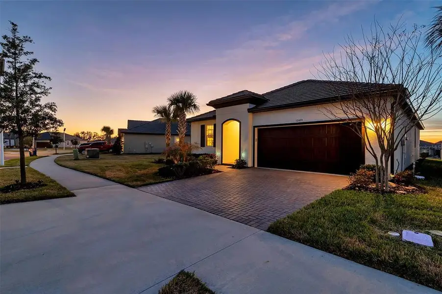 Front exterior of a new home in , San Antonio, FL, highlighting curb appeal (Image 23).