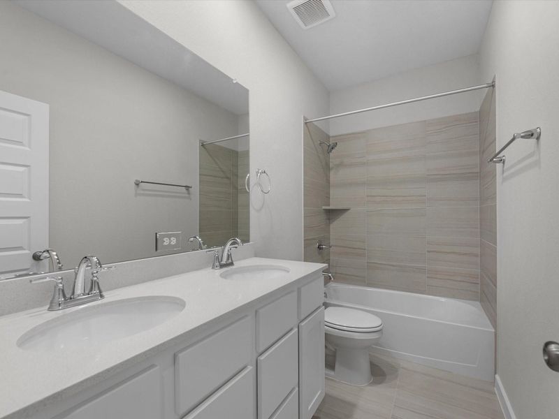 Furnished interior view inside a new home in Mason Woods, Cypress (Image 9).