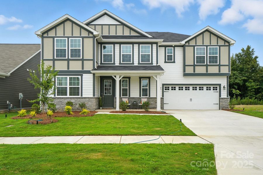 Front exterior of a new home in Waxhaw Landing, Monroe, NC, highlighting curb appeal (Image 23).