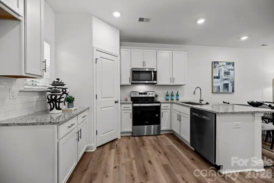 Furnished interior view inside a new home in Sycamore Trail, Matthews (Image 5).