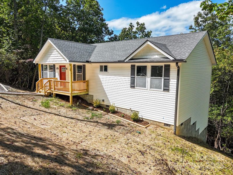 Front exterior of a new home in , Etowah, NC, highlighting curb appeal (Image 24).