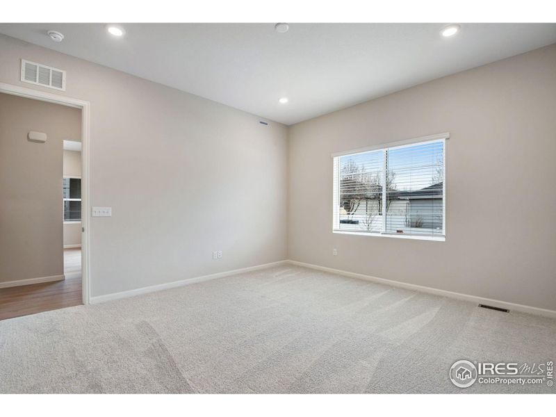 Spacious, unfurnished interior of a new home in Westside Crossing Paired Homes, Berthoud (Image 18).