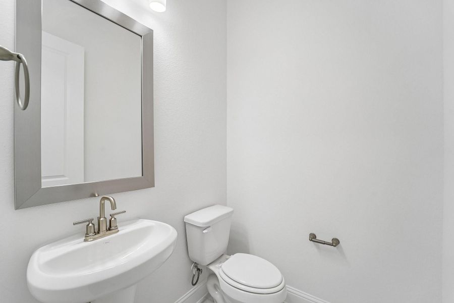 Furnished interior view inside a new home in Del Bello Lakes 60', Manvel (Image 15).