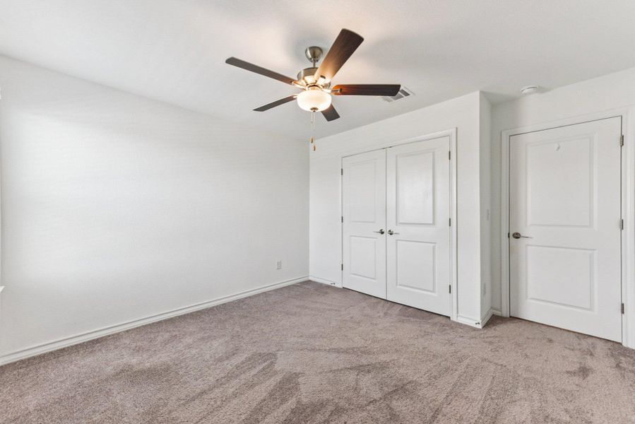 Spacious, unfurnished interior of a new home in Stonewall Ranch, Liberty Hill (Image 36).