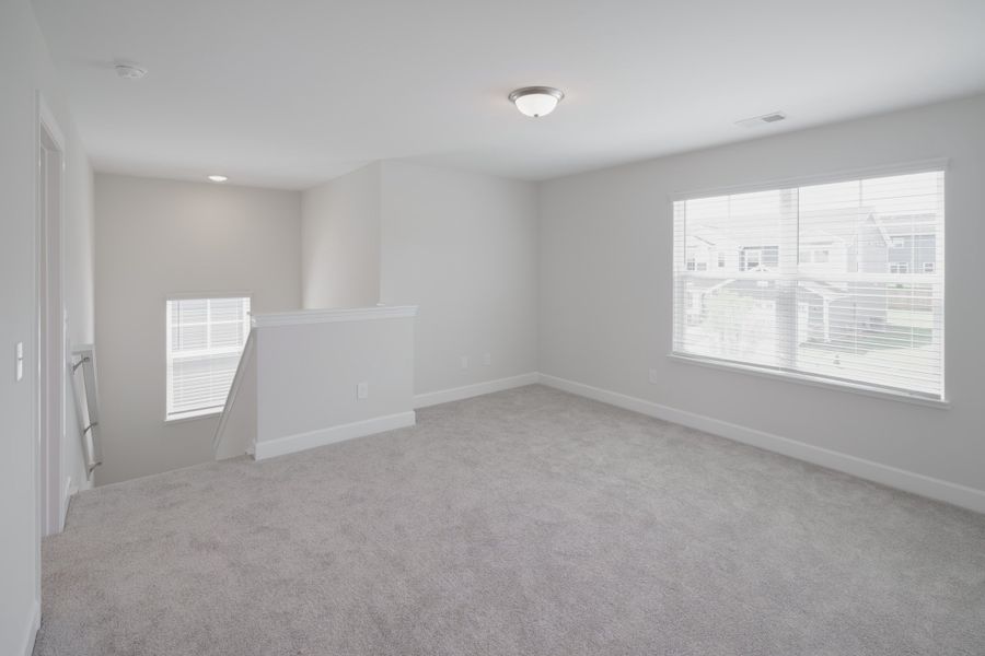 Representative unfurnished interior of a home built from the The Holland by Cothran Homes in Holly Ridge, Greenville (Image 33).