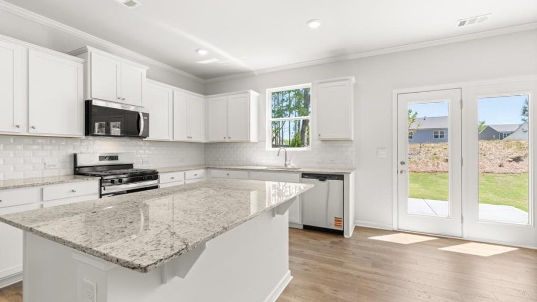 Furnished interior view inside a new home in Parkside at Carter Grove, Cartersville (Image 5).