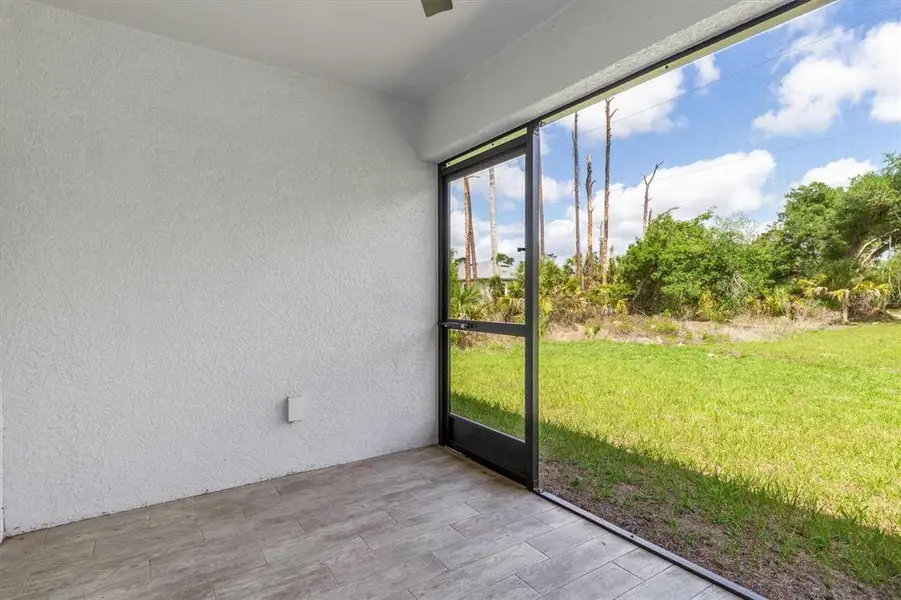 Exterior details and patio area of a home in , Port Charlotte (Image 19).