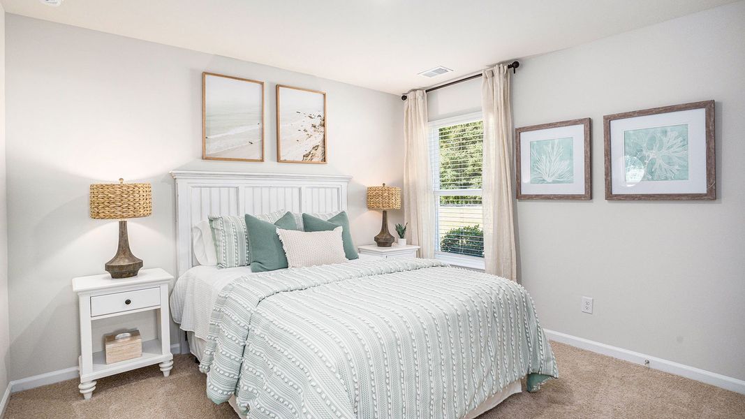 Furnished interior view inside a new home in Stanbury Creek, Supply (Image 11).