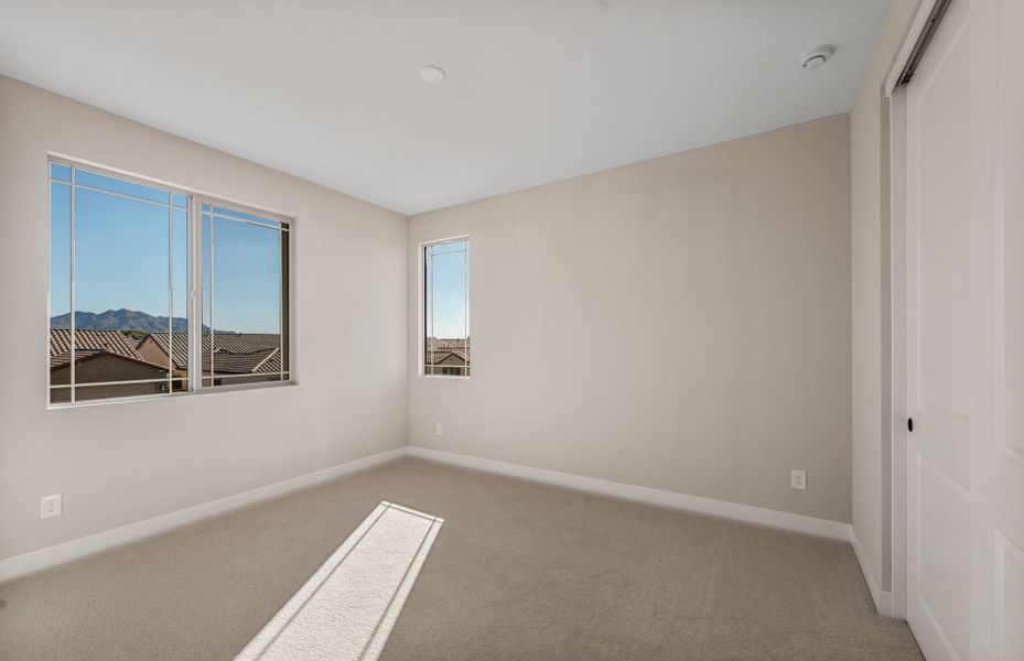 Spacious, unfurnished interior of a new home in Legado West, Queen Creek (Image 28).