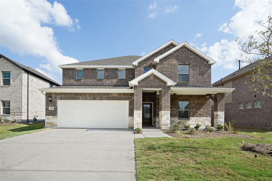 Craftsman-style house with a front yard