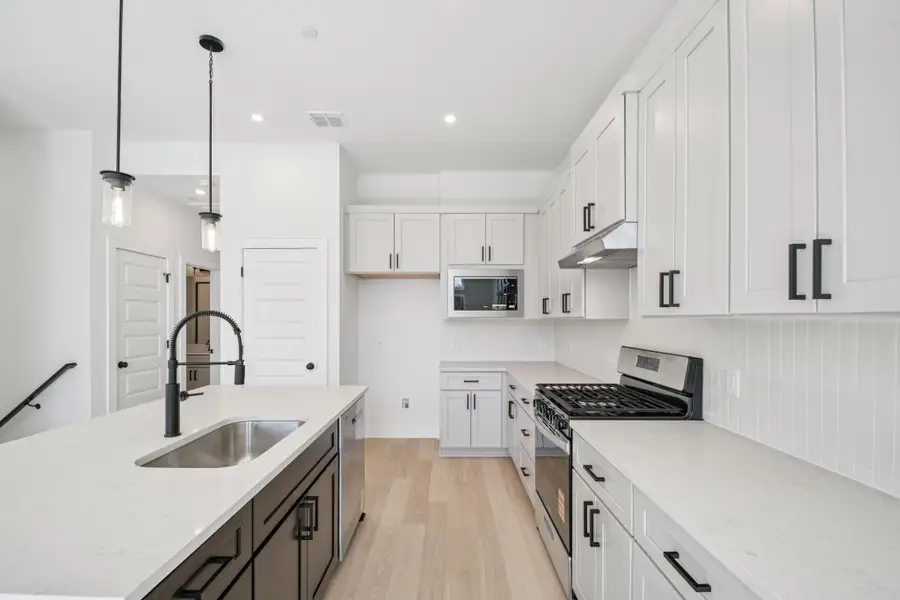 Furnished interior view inside a new home in Koenig Townhomes, Austin (Image 4).