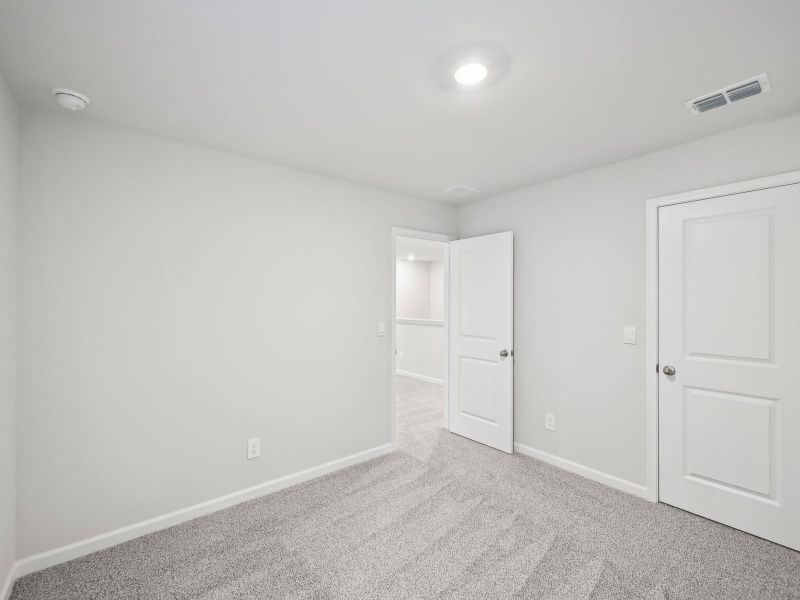 Spacious, unfurnished interior of a new home in Martin Springs - Estate Series, Lawrenceville (Image 23).