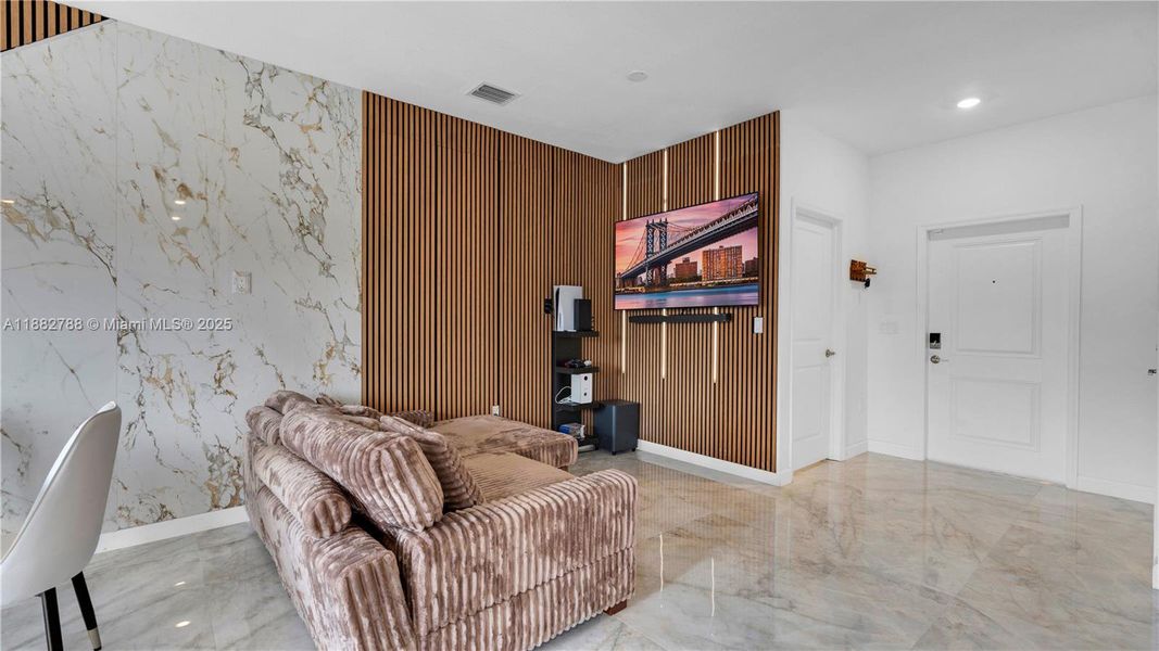 Upgraded porcelain tile flooring & LED-lit porcelain accent wall