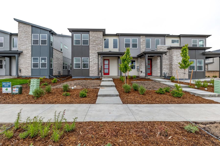 Front exterior of a new home in Painted Prairie, Aurora, CO, highlighting curb appeal (Image 2).